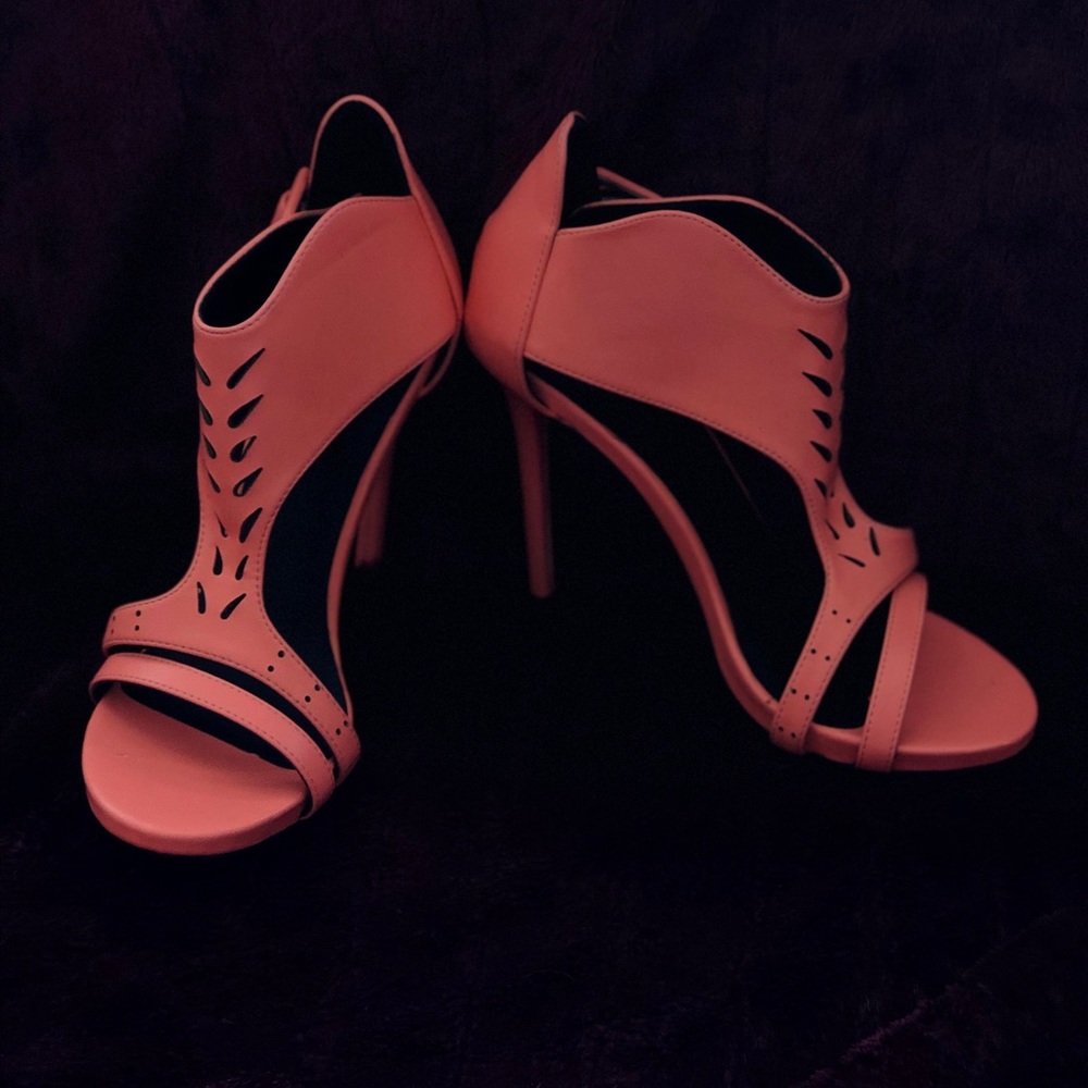 A pair of JustFab Heels